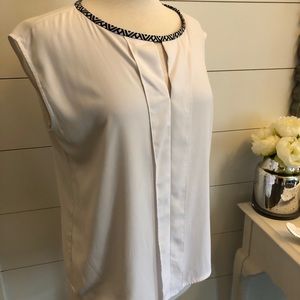 Sleeveless white top